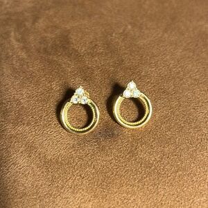 Faux gold/diamond pierced earrings.